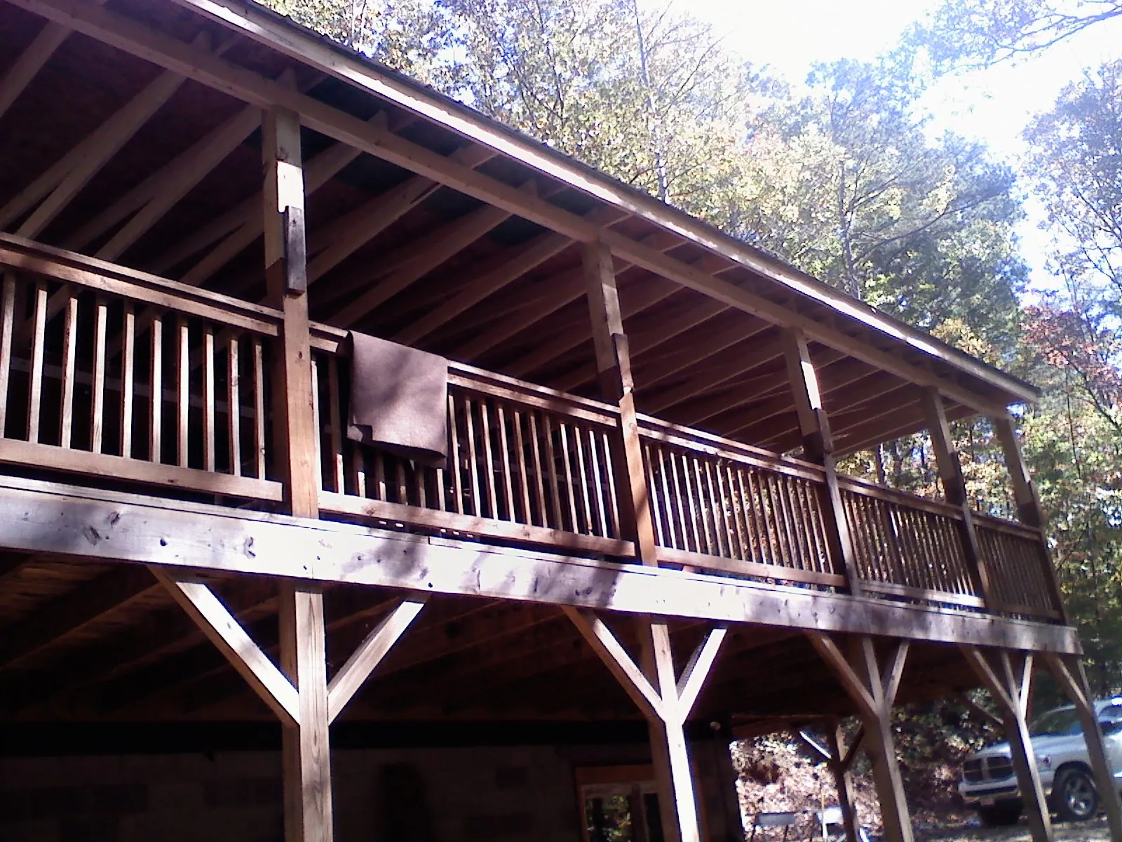 Timber framing under a new elevated porch and deck — Roof Leak Repair in Chesapeake Beach by Roofing Brothers